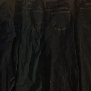 Four pair of blue jeans